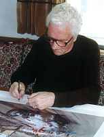 Signieren am Poster Manfred von Brauchitsch 1937