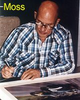 Signieren am Poster Vanwall 1957 Stirling Moss